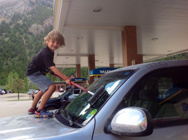 Finley's job during our road trip - washing the wind screen on a truck is fun!